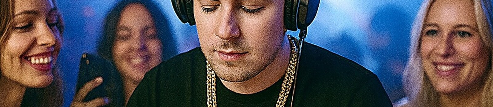 DJ Miguelito cover artwork: red decks & mixer on black